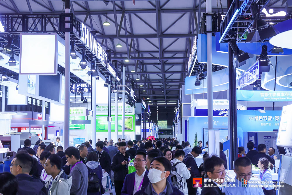 Crowds of visitors engaging with exhibitors at analytica China 2024 in Shanghai